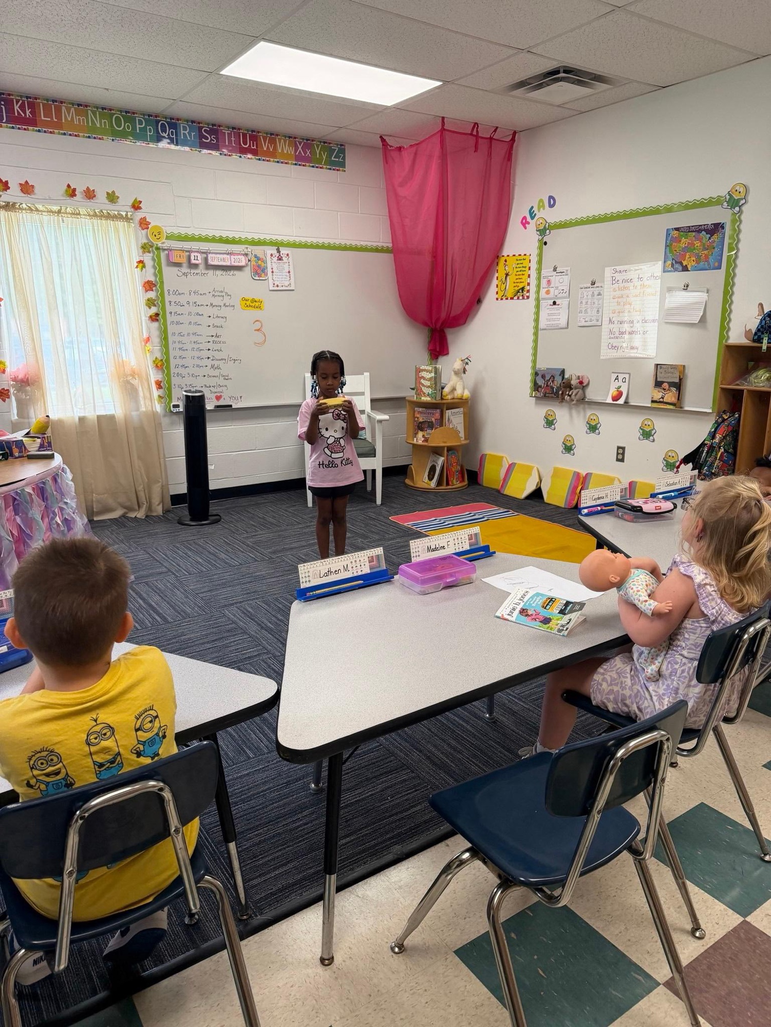 A student sharing with her classmates during show and tell at The Laurel School